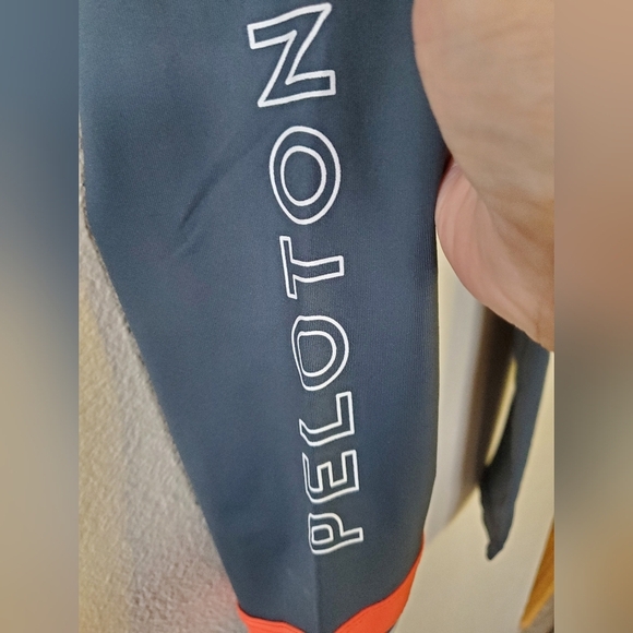 Peloton leggings, green with orange and white stripe. - Picture 2 of 4